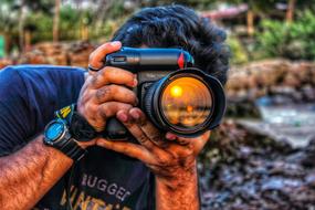 Man photographer sunset