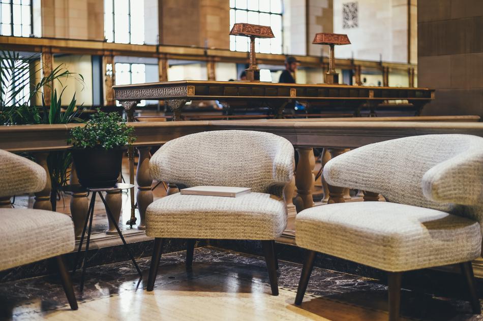 beige armchairs in the seating area