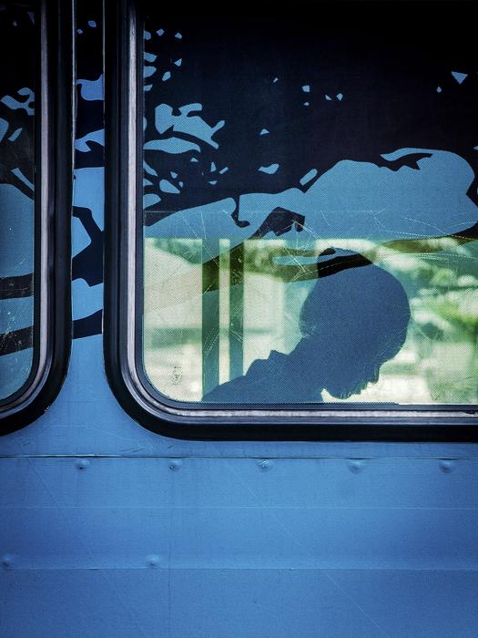 Girl in the train with view through the window