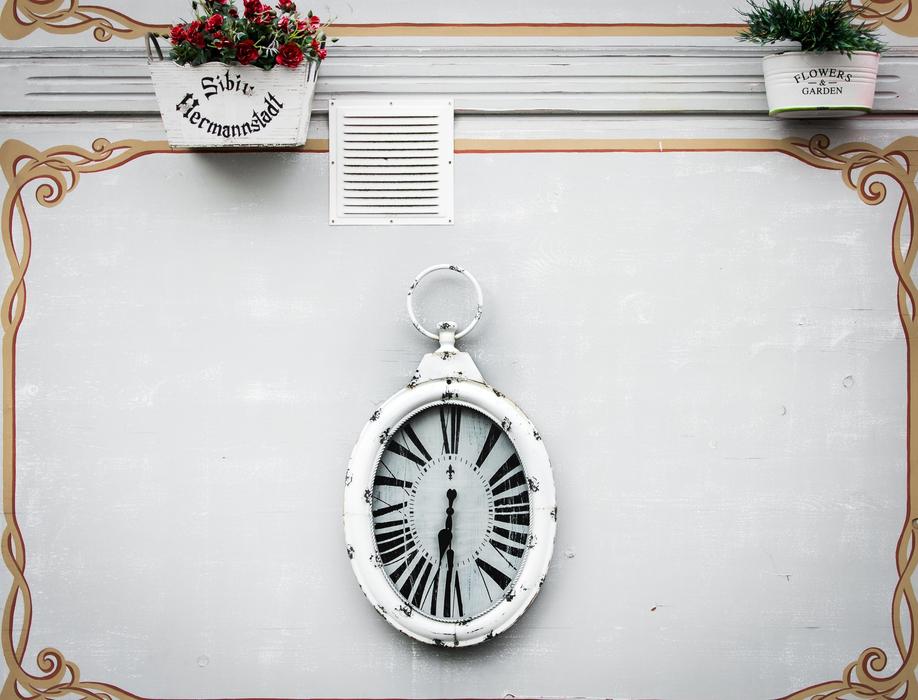 white clock on the wall landscape