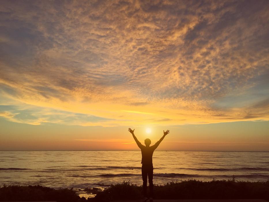 Guy Man Male on coast at sunset
