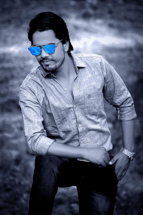 Man in blue glasses