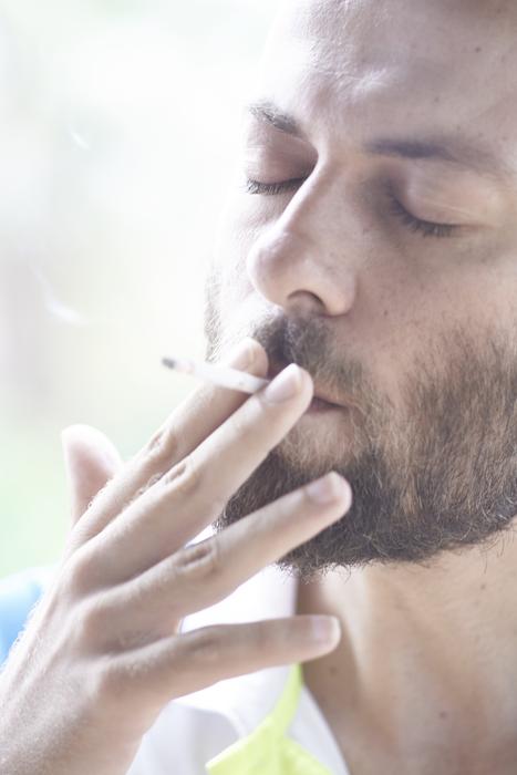 young man with Cigarette in lips