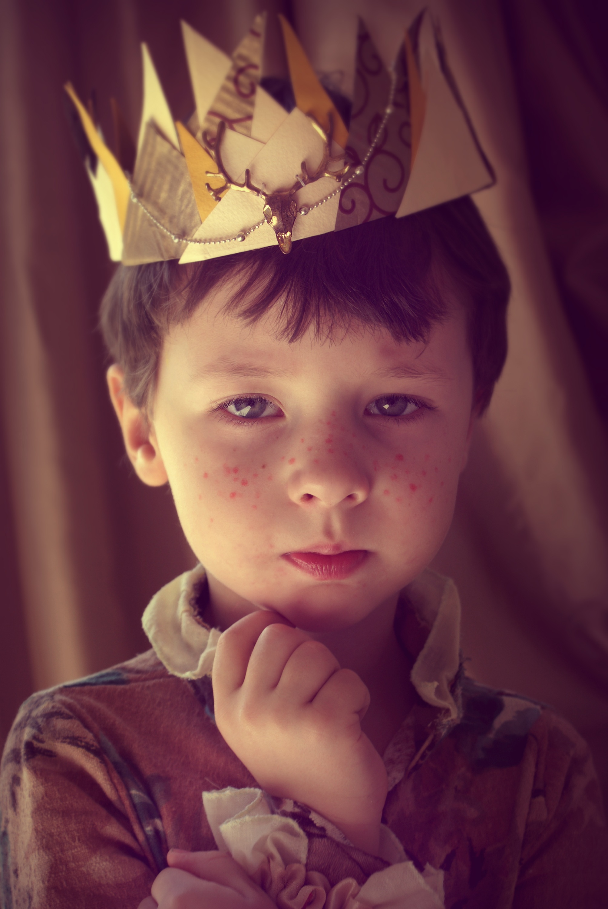 Portrait of a boy with a crown on his head free image download