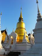 golden roof with a white church