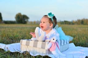 portrait of Child Joy on green grass