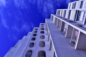 facade of mediterranean building against blue sky