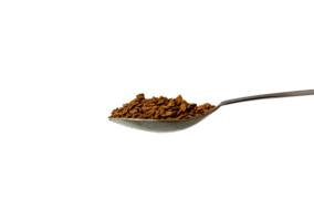 coffee beans on a spoon