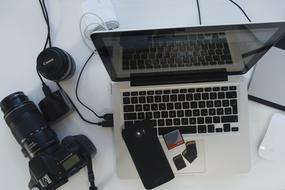 Equipment of a photographer, on the white table