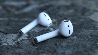 Airpods Apple Headphones close-up in blurred background