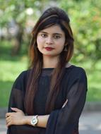 beautiful girl in black on a blurred nature background