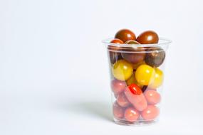 colored vegetables in a glass
