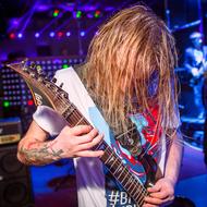 long-haired rock guitarist