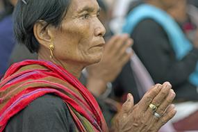 a nun with rings on her hands