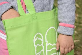 Girl with green bag