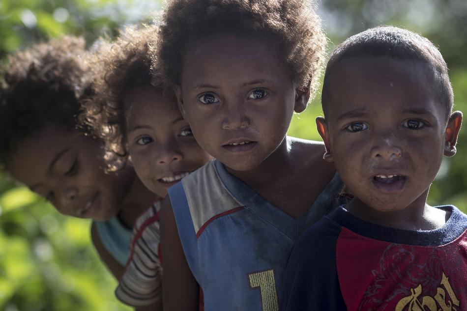 portrait of four cute african kids together outdoor