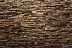 textured brown stone wall