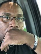 photo of a pensive man driving
