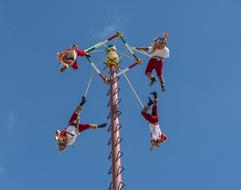 acrobats on a carousel on Cozumel