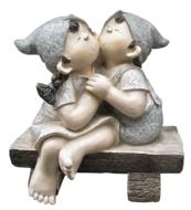 kissing boy and girl as ceramic figurine