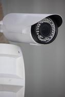 Close-up of the shiny, white Cctv camera