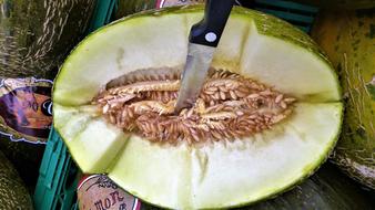 knife stuck in the fruit