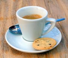 sweet bitter drink with cookies