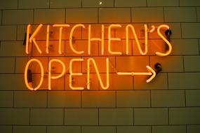 bright neon sign on the wall