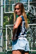 young Girl posing on sportsground
