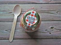 wooden spoon near the jar