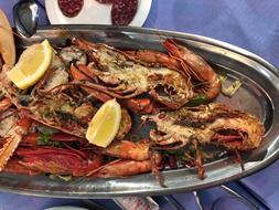 Boiled seafood with lemon