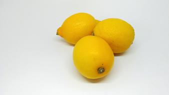 Three ripe lemons