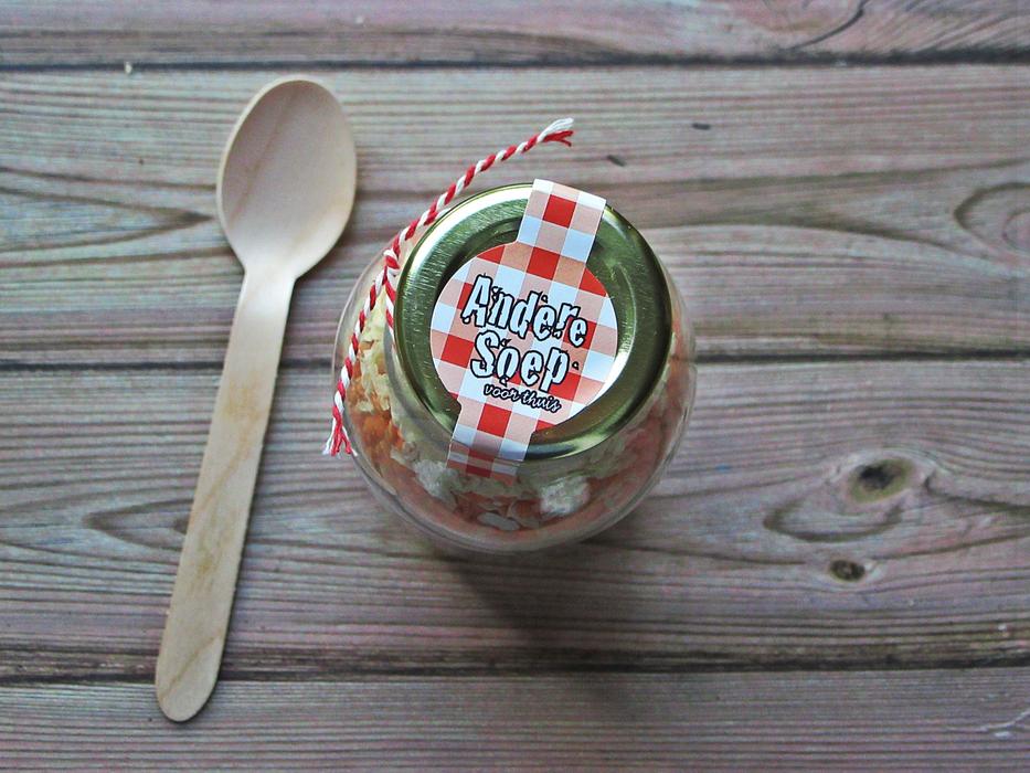 wooden spoon near the jar