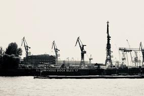 black and white, harbor cranes transport system in Hamburg