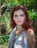 Portrait of young girl with bright makeup