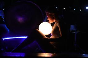girl and the glowing ball