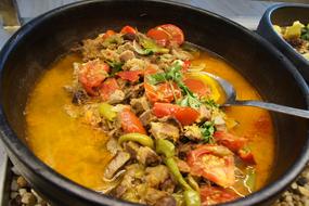 meat and soup in a bowl