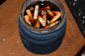 tobacco butts in the water