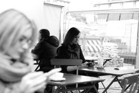 Girls relaxing in a cafe