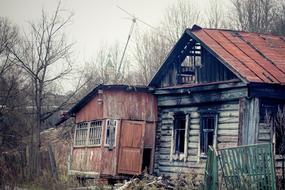 collapsed old houses in rural outback, russia