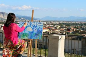 girl painting a picture