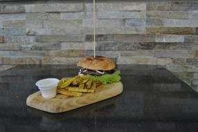 burger with gravy and potatoes