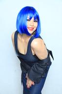 blue haired girl smiling