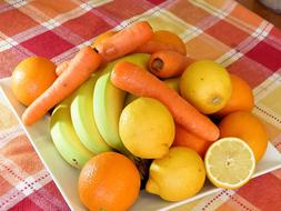 Healthy fruits and vegetables on the plate