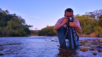 Boy Photographer on lake