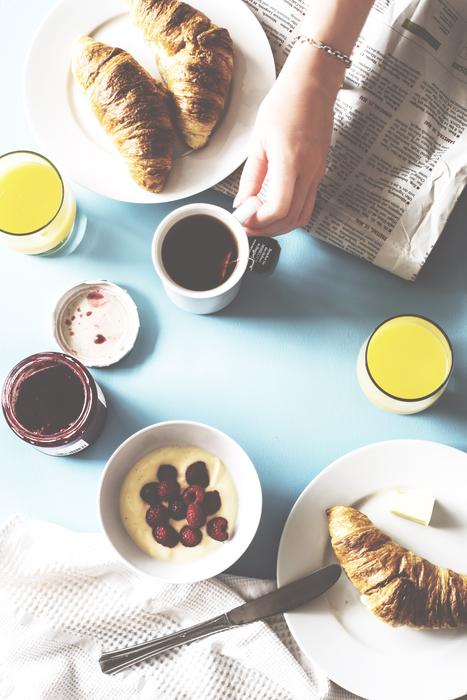 hand near breakfast