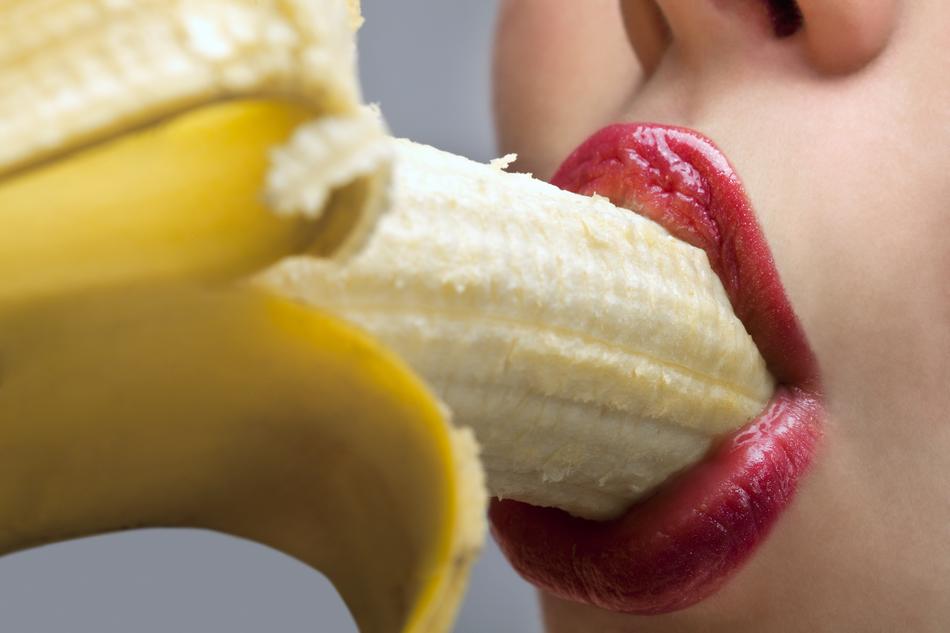 girl eating a banana