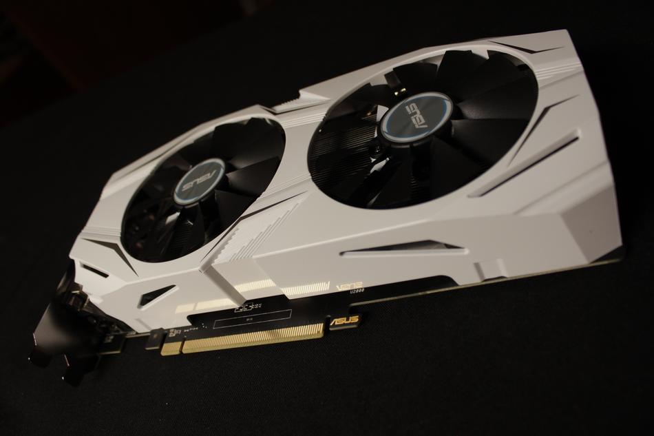 Close-up of the beautiful, black and grey 'Asus' video card, at black background
