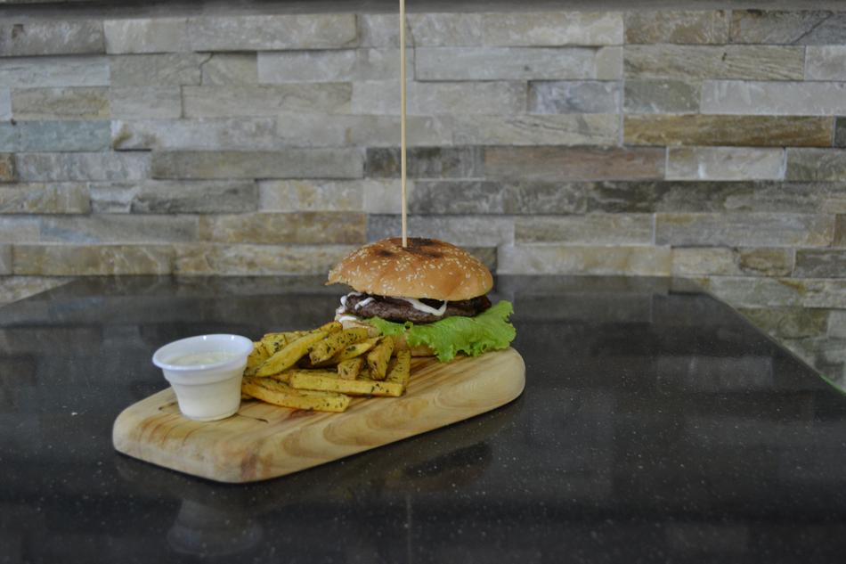 burger with gravy and potatoes