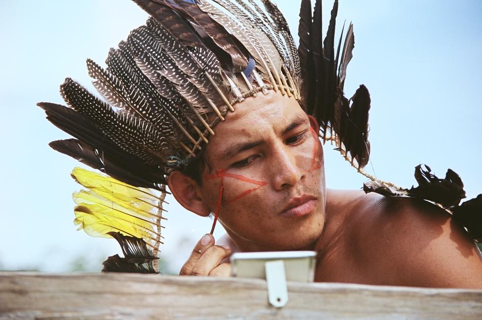 Portrait of the Kaxinawá man with feathers, in Acre, Brazil
